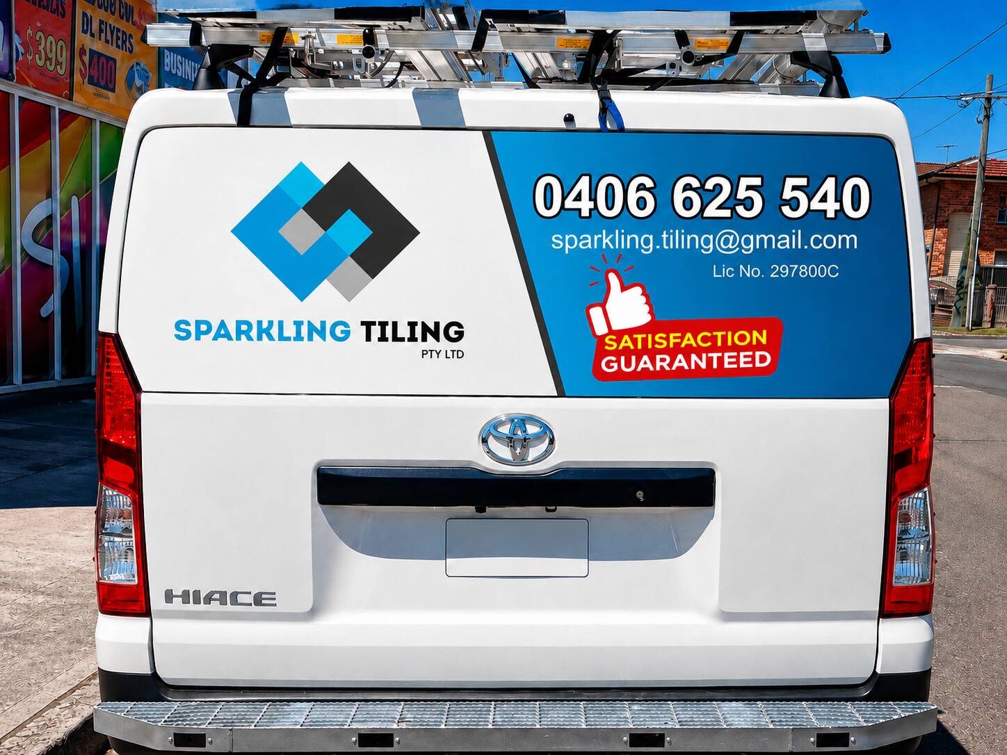 Sparkling Tiling craftsman holding a stone tile